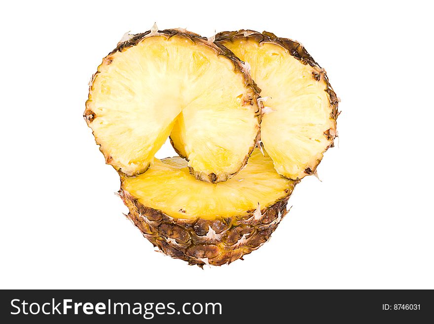 Sliced ripe pineapple isolated on white background