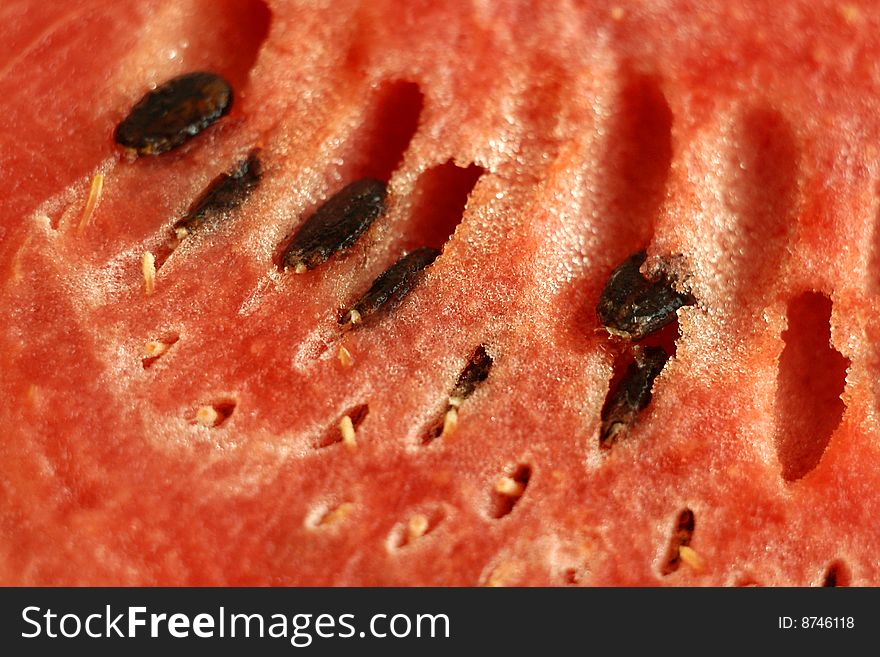 Red juicy watermelon section cut close-up. Red juicy watermelon section cut close-up