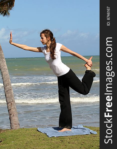 Balance and yoga exercises on the beach. Balance and yoga exercises on the beach