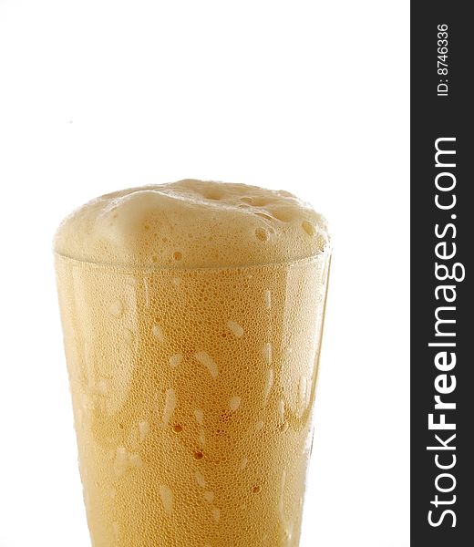 A glass of beer on white background. A glass of beer on white background