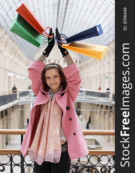 Young adult girl with colored bags. Young adult girl with colored bags