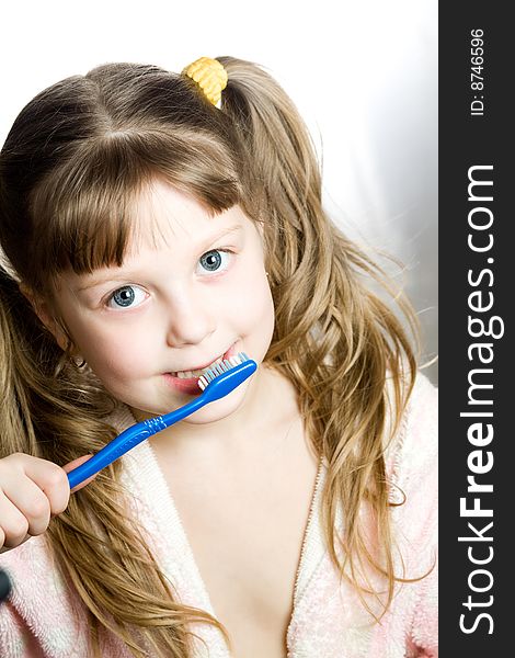 Girl with toothbrush