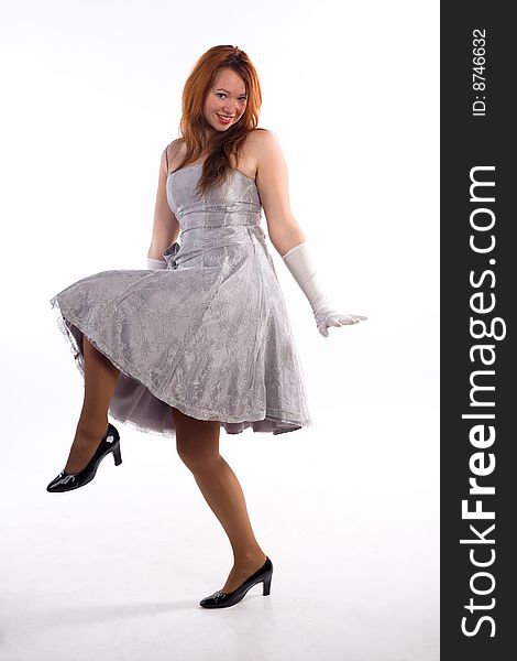 Young girl with white gloves standing on white background. Young girl with white gloves standing on white background