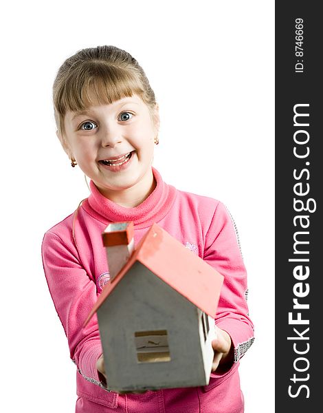 Stock photo: an image of a girl with a little house in her hands. Stock photo: an image of a girl with a little house in her hands
