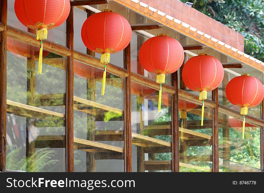 A house with Red lanterns as part of the Chinese New Year decorations in guangzhou yuexiu park.