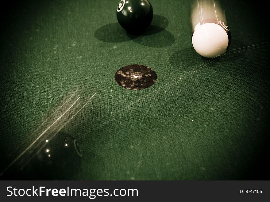 Vintage billard balls on green table