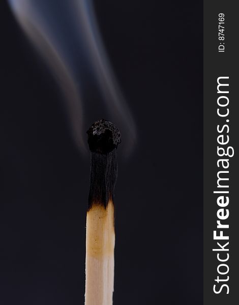 Smoke matches on a black background