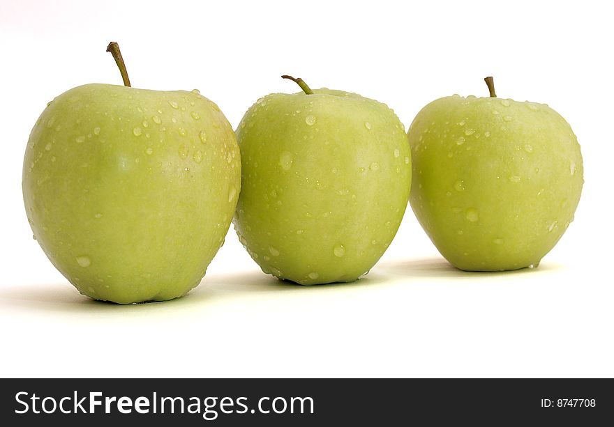 Color photo of green apples on white background
