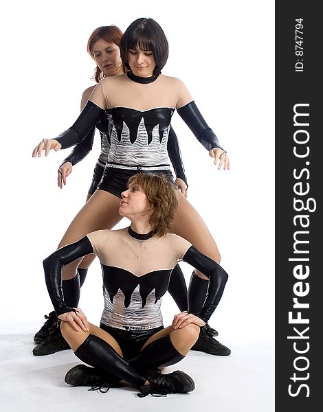 Three dancers in same costumes on white. Three dancers in same costumes on white