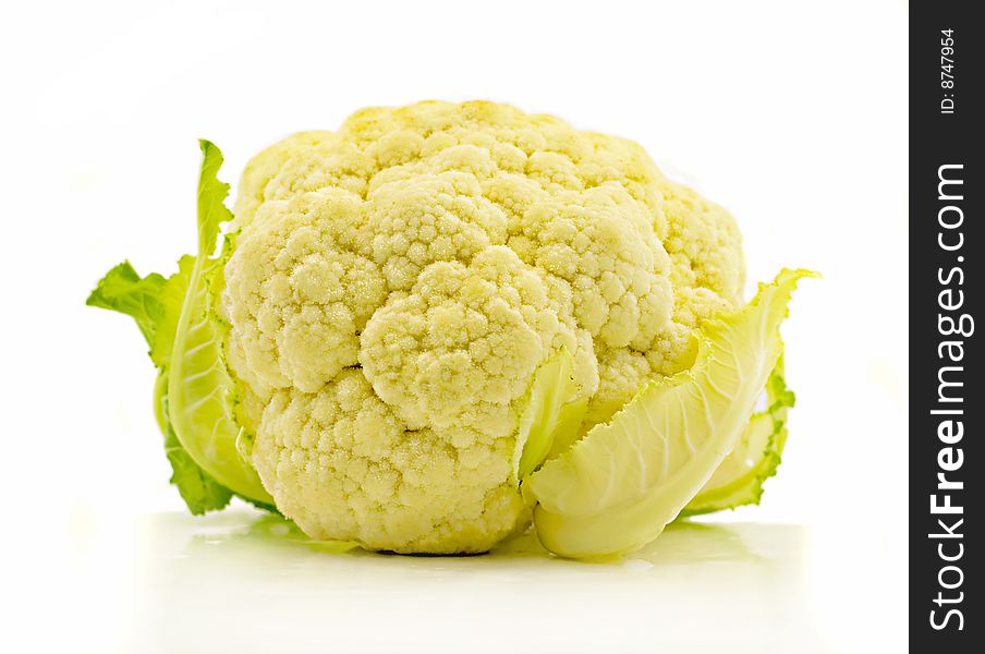 Cauliflower with leaves isolated on the white