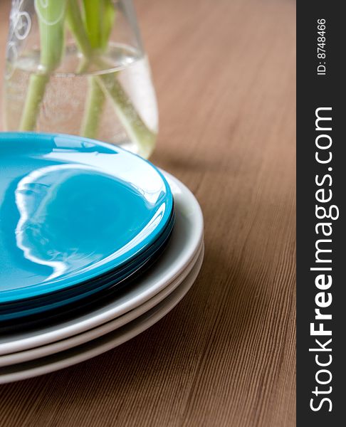 Clean Plates on Wooden Table. Clean Plates on Wooden Table