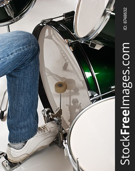 Close up of drummer feet on the  bass drum pedal,check also <a href=http://www.dreamstime.com/musical-instruments-and-musicians-rcollection9620-resi828293>Musical instruments and musicians</a>