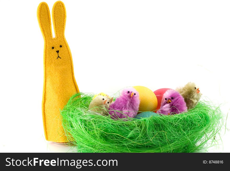 This image shows a basket full of colorful Easter eggs.