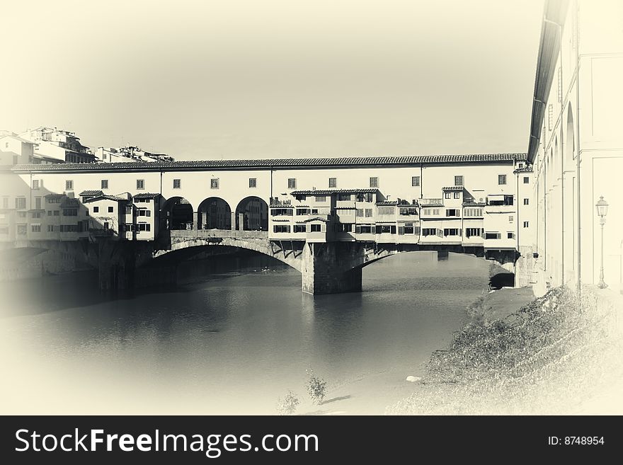 Famous old medieval bridge Ponte Vecchio in Florence,Italy-photo in retro style