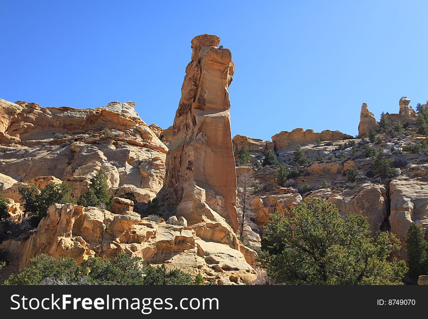 View of red rock formations in San Rafael Swell with blue skyï¿½s