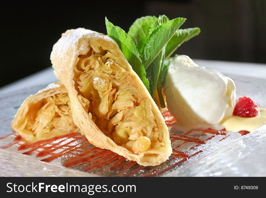 Vanilla ice-cream with a baked apple strudel