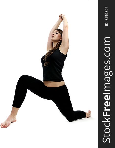 Young woman is doing an expert yoga exercise