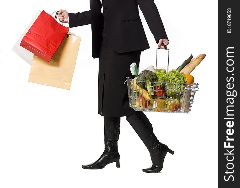 Shopping girl with bags towards white background