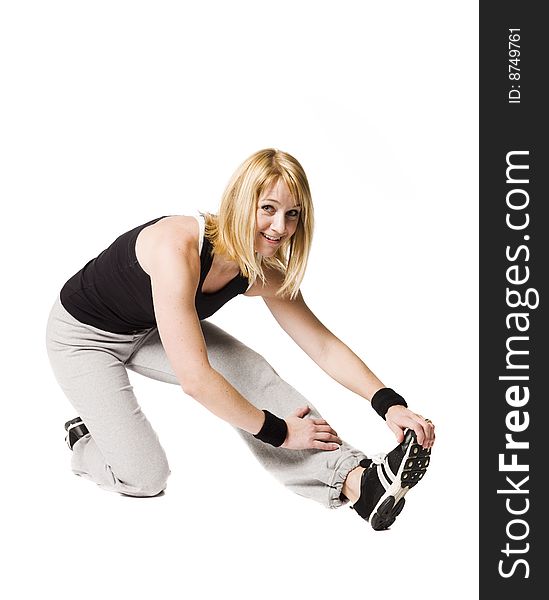 Woman working out towards white background