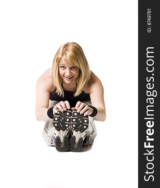 Woman working out towards white background