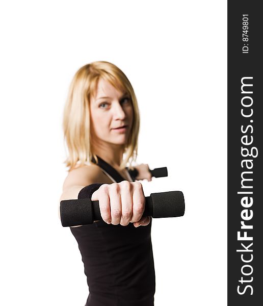 Woman working out towards white background