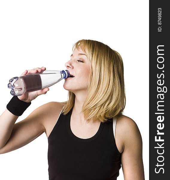 Girl drinking water towards white background