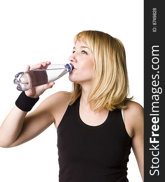 Girl drinking water towards white background