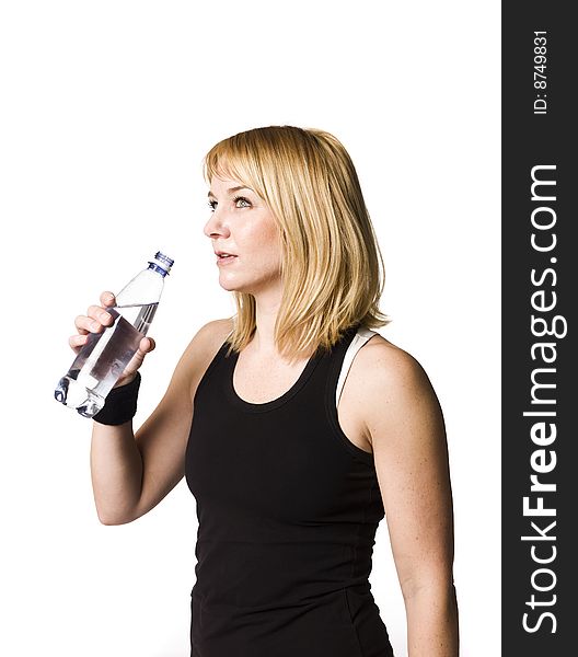 Girl drinking water towards white background