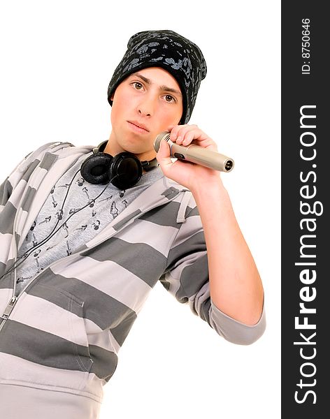 Handsome male hip hop youngster with headphones, studio shot. Handsome male hip hop youngster with headphones, studio shot