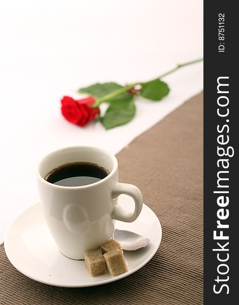 AN abstract picture of a cup of coffee and a rose. AN abstract picture of a cup of coffee and a rose