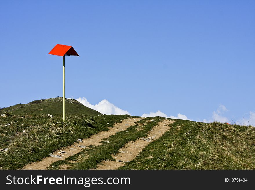 A sign mark the top of the mountain