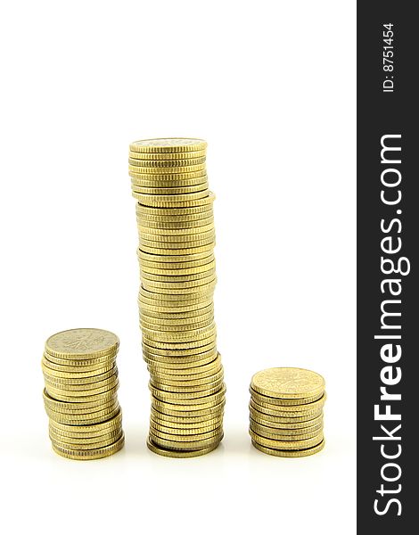 Polish coins arranged in columns, towers, white background. Polish coins arranged in columns, towers, white background