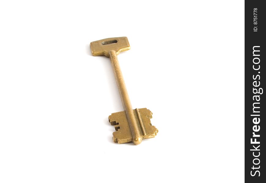 Gold key isolated on white background