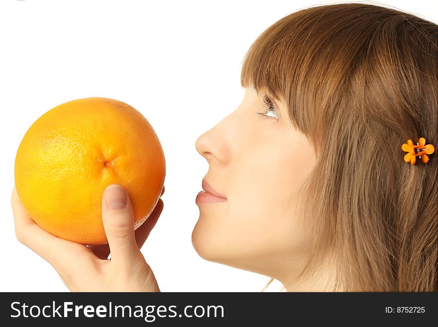 Young woman with grapefruit over white