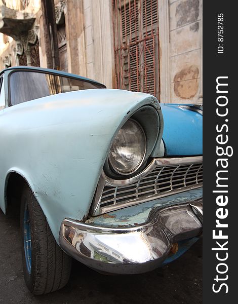 Old Blue Car Right Headlamp Closeup