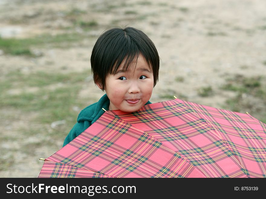 The lovely  little girl in the park.