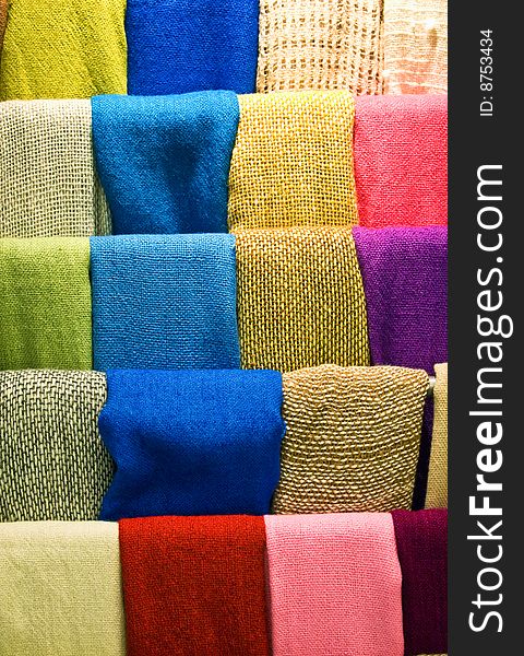 Colorful woolen scarves close-up