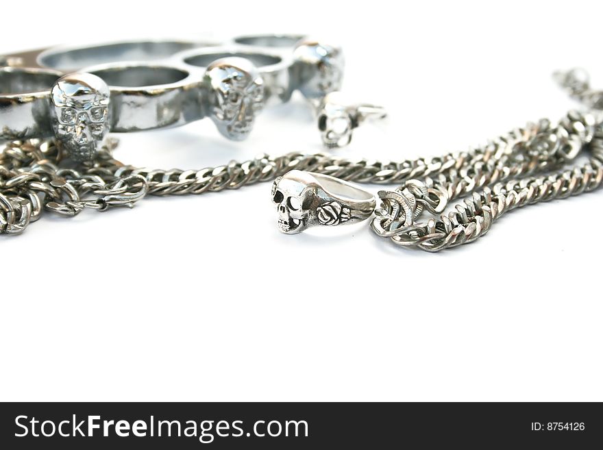 Skull rings,kastet,chain isolated on white background.