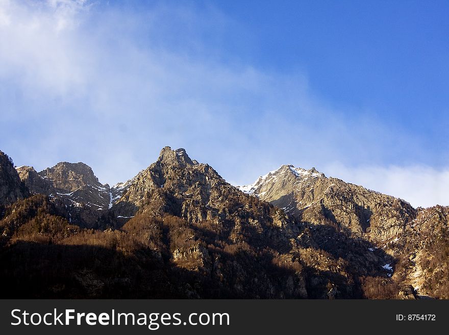 Mountain with blue sky and white clouds