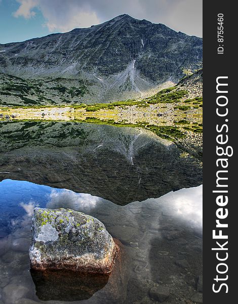 The glacial lake in the Rila (bulgarian mountains). The glacial lake in the Rila (bulgarian mountains)