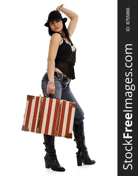 Full body view of attractive young woman walking or running with a striped red and white suitcase and a black hat. Isolated on white. Full body view of attractive young woman walking or running with a striped red and white suitcase and a black hat. Isolated on white.