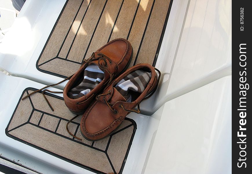 Boat shoes on the deck. Boat shoes on the deck