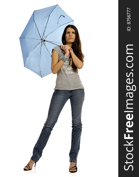 Full body view of attractive woman with blue umbrella in casual wear, standing. Isolated on white background. Full body view of attractive woman with blue umbrella in casual wear, standing. Isolated on white background.