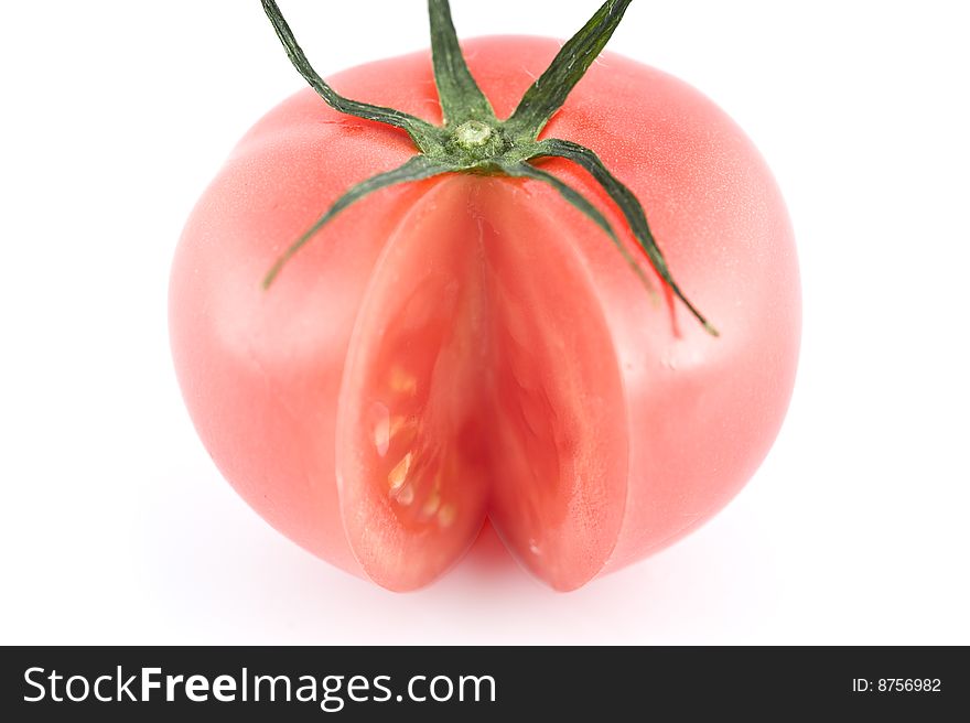 Cut tomato on white background. Cut tomato on white background