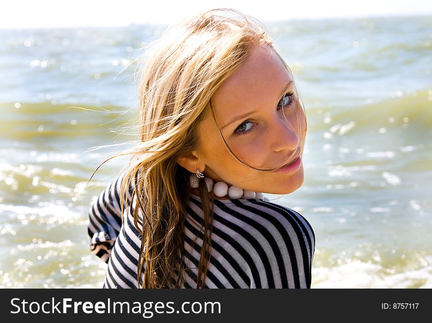 A young girl on the seashore, summer. A young girl on the seashore, summer