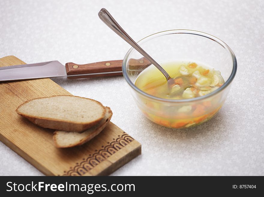 A photo of plate of with soup