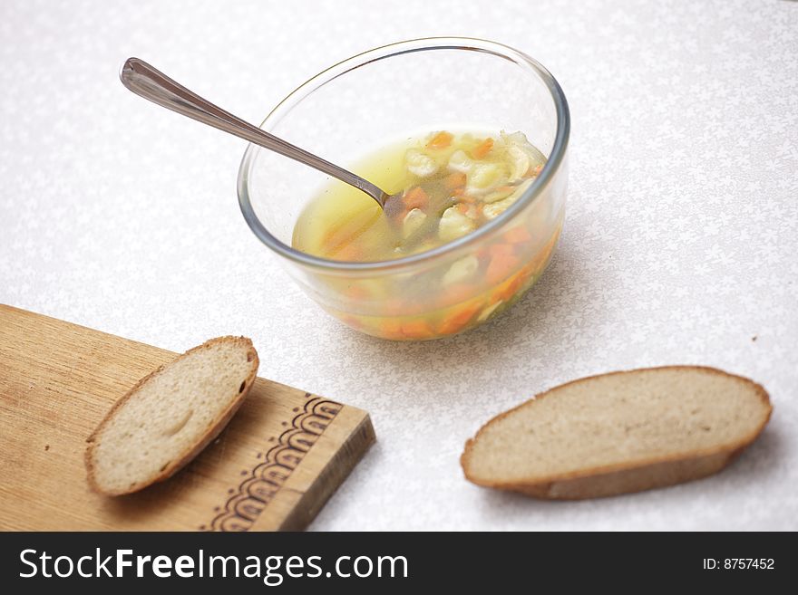 A photo of plate of with soup