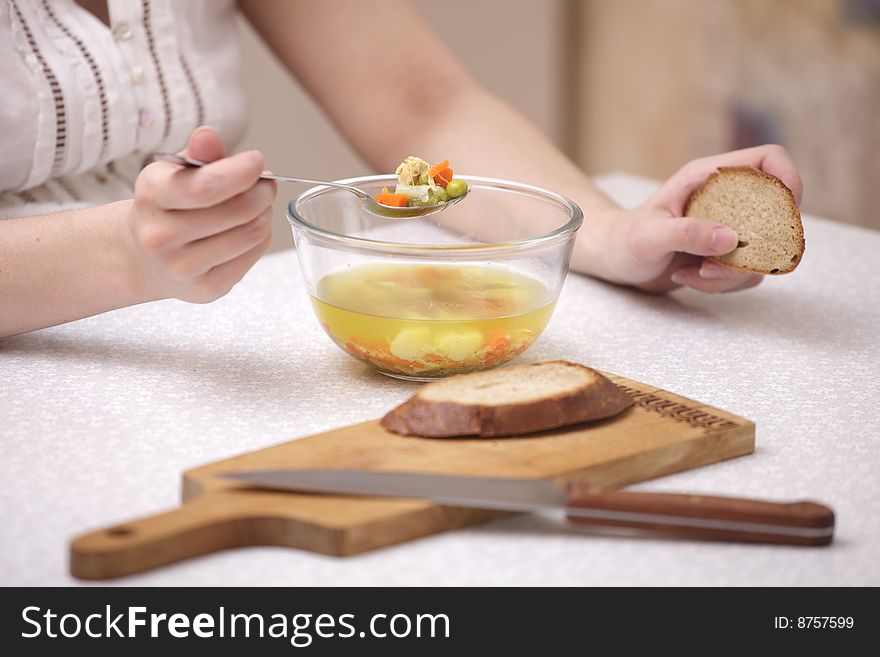 A photo of plate of with soup