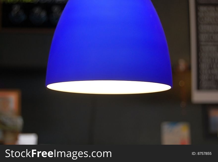 Blue lamp in a coffee shop