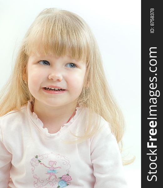 Portrait of smiling blue eyed blonde girl. Portrait of smiling blue eyed blonde girl